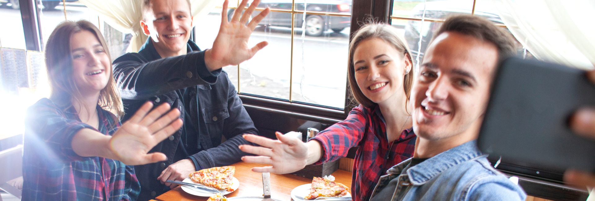 Friends Taking Group Selfie Over Pizza 1920X650